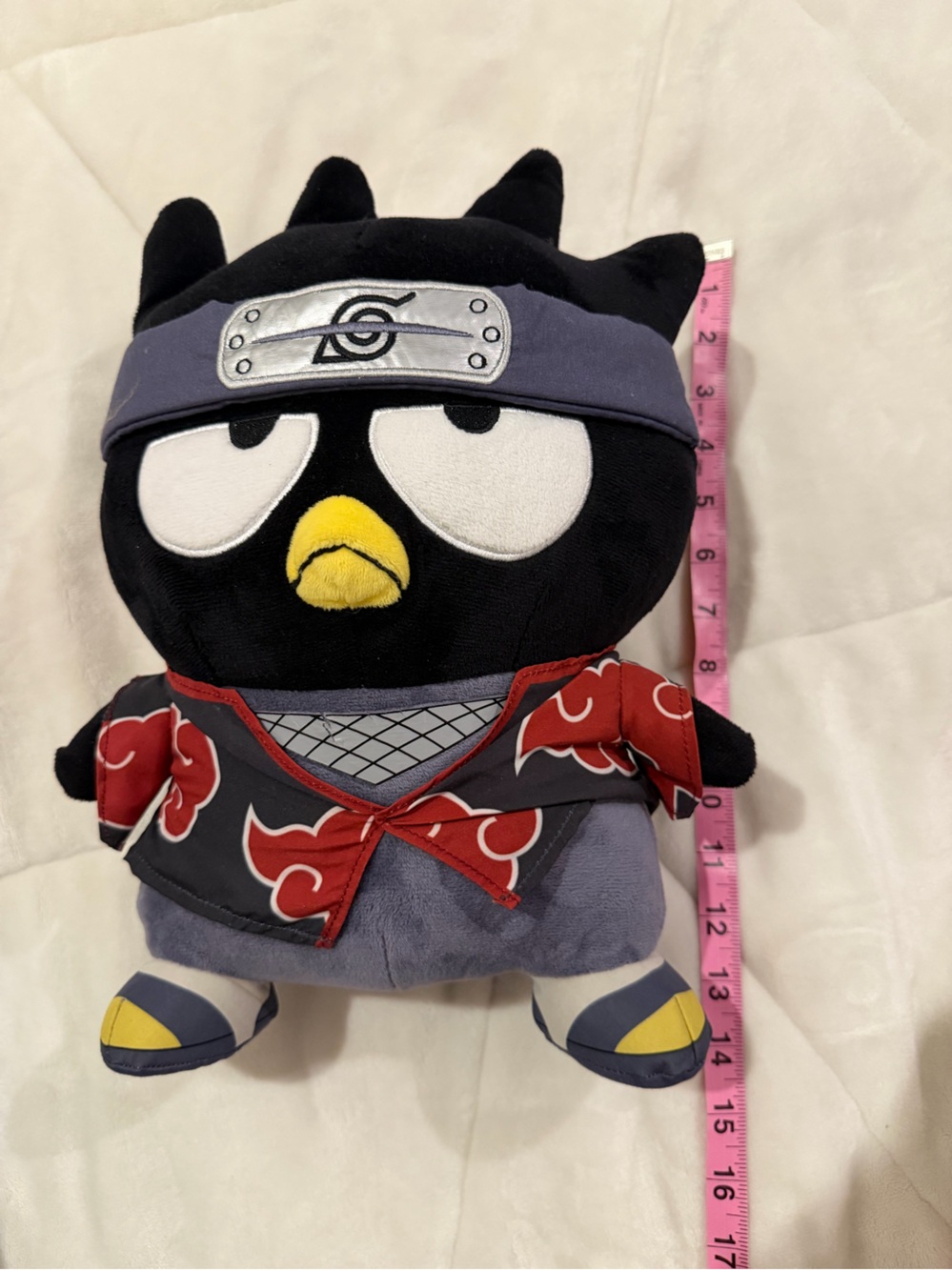 Kuromi from Sanrio dressed as Itachi Uchiha from Naruto Shippuden